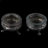 A pair of 19th century Chinese export silver salt cellars, circa 1860, by Hoaching, Canton, relief