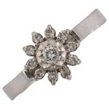 An 18ct white gold diamond flowerhead ring, set with modern round brilliant and single-cut diamonds,