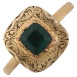 An Antique green paste dress ring, unmarked yellow metal closed-back settings with engraved