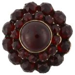 A 19th century Bohemian garnet cluster ring, unmarked gold closed-back settings with round