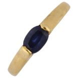 A Continental gold sapphire dress ring, set with oval mixed-cut sapphire measures: 5.60mm x 4.20mm x