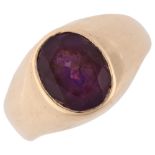 An 18ct gold amethyst signet ring, bezel set with oval mixed-cut amethyst, setting height 11.7mm,