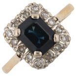 An 18ct gold sapphire and diamond cluster ring, set with emerald-cut sapphire and single-cut