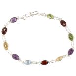 A modern sterling silver gem set line bracelet, gemstones include peridot amethyst citrine and