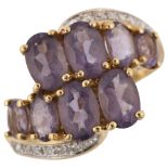 A modern 9ct gold amethyst and diamond crossover ring, setting height 12.7mm, size K, 2.9g No damage