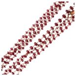 A modern 9ct rose gold garnet bead necklace, bead diameter 3.7mm, necklace 120cm, 11.6g No damage or