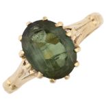 A 9ct gold green tourmaline dress ring, claw set with oval mixed-cut tourmaline, setting height 10.