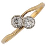 An early 20th century 18ct gold two stone diamond crossover ring, set with old European-cut