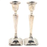 A pair of George V silver table candlesticks, by Robert Pringle & Sons, hallmarks Chester 1917,
