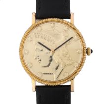 TRESSA - a gold plated Liberty coin mechanical wristwatch, with fluted bezel and cabochon crown,