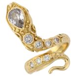 A fine 18ct gold diamond figural snake ring, closed back settings with chased foliate design, ruby