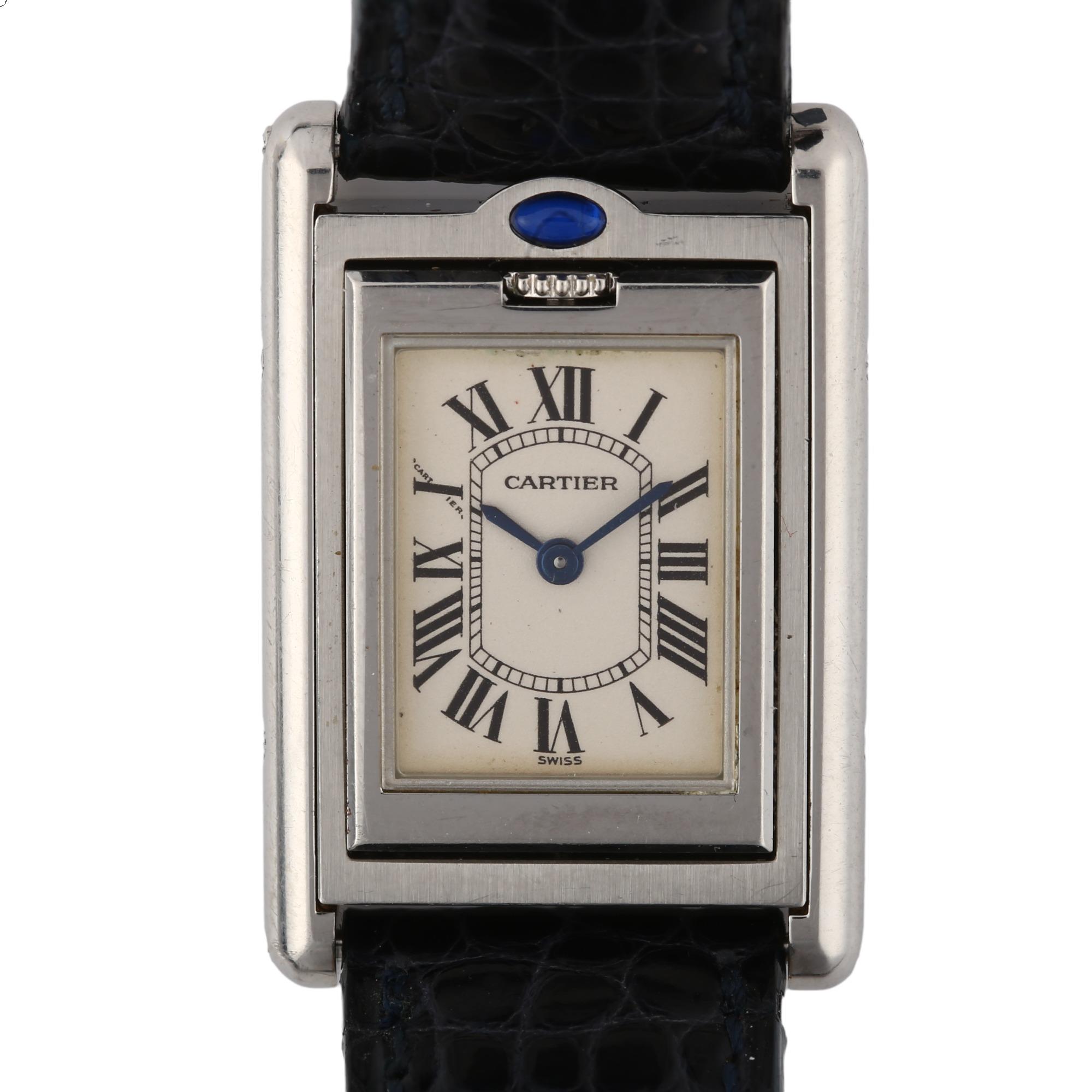 CARTIER - a lady's stainless steel Tank Basculante quartz wristwatch, ref. 2386 circa 2003, silvered