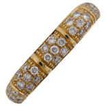 A heavy modernist 18ct gold diamond ring, pave set with modern round brilliant-cut diamonds, total