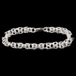 A modern handmade sterling silver hoop link chain bracelet, by Claude Wilkes, hallmarks London 2018,