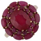 A modern 9ct gold ruby cluster ring, 19.8mm, size R, 5.5g No damage or repairs, all stones