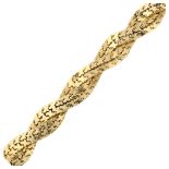 A heavy unmarked gold woven bracelet, polished and textured design, tests as approx 18ct, bracelet