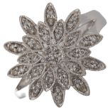 A 14ct white gold diamond flowerhead ring, set with single-cut diamonds, setting height 17.3mm, size