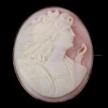 A 19th century pink coral cameo brooch, relief carved depicting Selene, Greek Goddess of the moon,