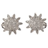 A pair of 14ct white gold diamond flowerhead earrings, set with single-cut diamonds and clip and