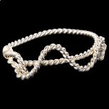 A heavy modern handmade sterling silver rope twist bangle, by Claude Wilkes, hallmarks London