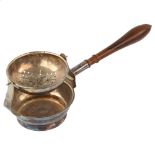 An Elizabeth II silver gimballed tea strainer on stand, with turned wood handle, by Hugh Crawshaw,