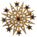 A late 20th century 9ct gold sapphire and pearl 8-ray starburst brooch, hallmarks London 1975,