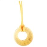 LALIQUE - an amber glass laurel wreath disc pendant, signed Lalique France, diameter 44.1mm, 14.