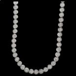 A long sterling silver cubic zirconia circular panel necklace, length 88cm, 71.9g No damage or