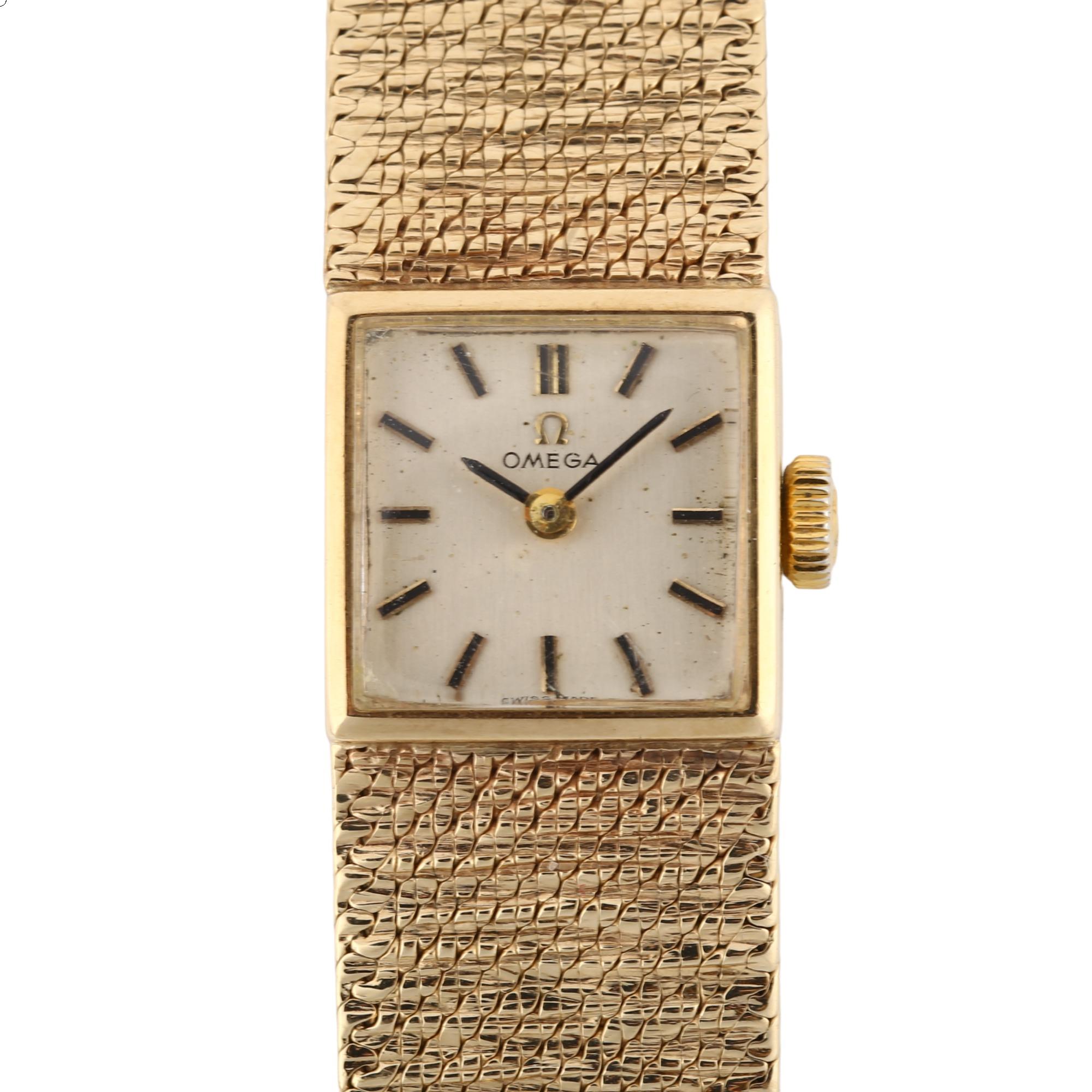 OMEGA - a lady's 9ct gold mechanical bracelet watch, circa 1968, silvered dial with baton hour
