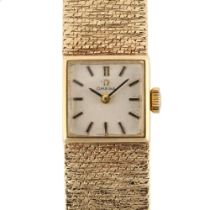 OMEGA - a lady's 9ct gold mechanical bracelet watch, circa 1968, silvered dial with baton hour