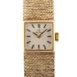 OMEGA - a lady's 9ct gold mechanical bracelet watch, circa 1968, silvered dial with baton hour