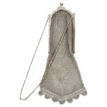 An Art Deco George V silver chainmail evening bag, with engraved floral silver frame and chain,