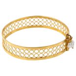 A Middle Eastern unmarked gold torque bangle, openwork form with freshwater pearl clasp, band