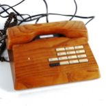 GFELLER TRUB, A 1970s'/80s' solid elm telephone Asterisk button missing cover, other good condition