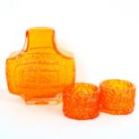 GEOFFREY BAXTER for Whitefriars Glass, a Tangerine TV textured vase and two Tangerine candle