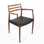NIELS OTTO MOLLER for JL MOLLER, a Model 62 rosewood dining armchair chairs, designed 1962, with