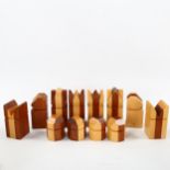 A Modernist teak and oak mid-century chess set, tallest 9cm Light use, good condition.