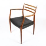 NIELS OTTO MOLLER for JL MOLLER, a Model 62 rosewood dining armchair chairs, designed 1962, with