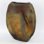 A studio pottery raku fired vase, signed to base, height 29cm Good condition, no chips, cracks or