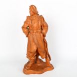 RUDOLF HLAVICA, (1897-1971), a terracotta pottery sculpture of a soldier by Pexider, Czechoslovakia,