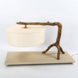 A solid bronze tree table lamp on leather covered base, length 61cm Good condition, wired for