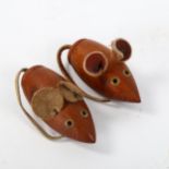 A mid-century teak salt and pepper set in mice form, in the manner of KAY BOJENSEN, length 7.5cm