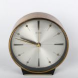 A mid-century Metamec Quartz clock with copper trim. Good working order