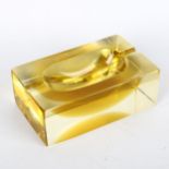 FLAVIO POLI, Murano, a 1970s' ochre sommerso cube ashtray, length 13cm Good condition, no chips or