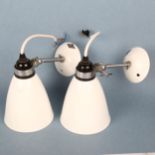 A pair of vintage BTC porcelain wall lights, with makers label Good condition, no chips or cracks,