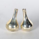 JENS QUISTGAARD for Dansk Designs - a pair of Danish silver plated leaning onion candle taper