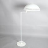 A 1970s' standard lamp with plexiglass shade, h 130cm Good condition, recently rewired and tested