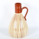 INGRID ATTERBERG for Ekeby Workshop, a 1947 designed Randi pattern stoneware vase with handle,