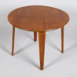 A mid-century mahogany lamp table by Gordon Russell, makers stamp, H 46cm x dia 61cm some wear to