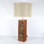 A mid-century teak and cork table lamp, with new hesian shade, overall height 75cm Good overall